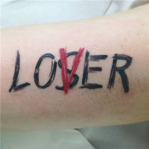 What does the lover loser tattoo mean